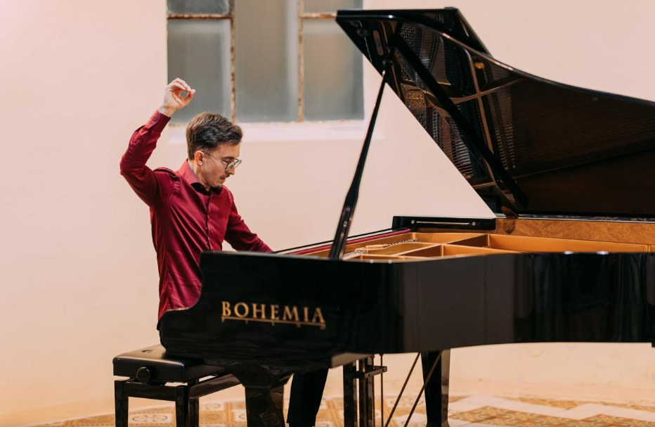 Pianist Michal Pospíšil at the concert grand